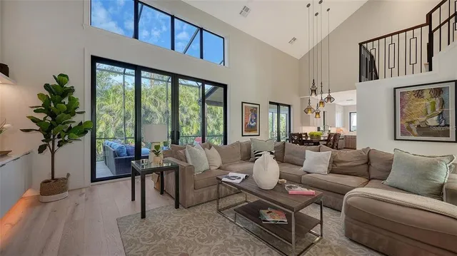 a kitchen with stainless steel appliances kitchen island granite countertop a refrigerator and a stove