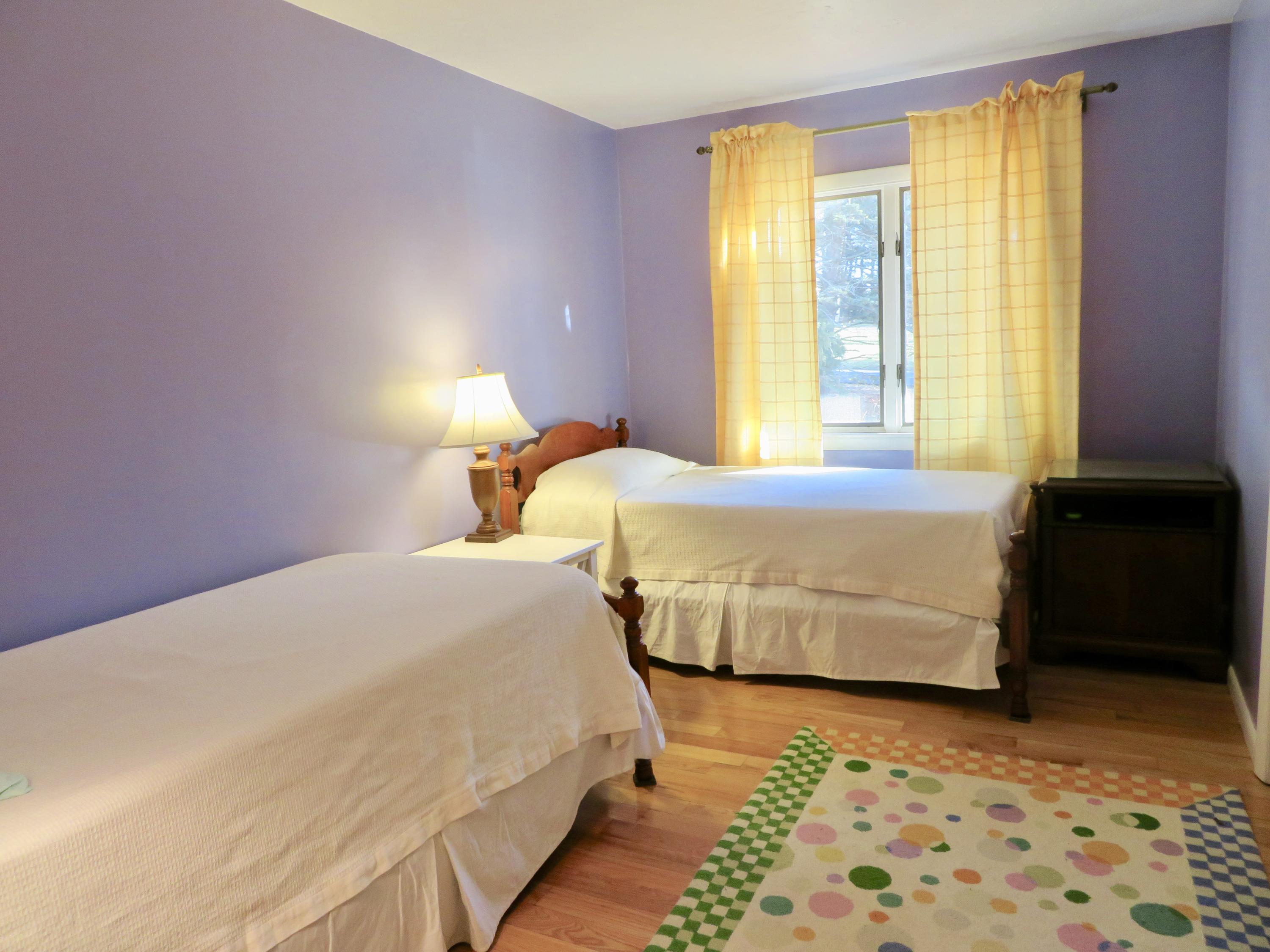 111 Elgin Road Pocasset, MA 02559 - Photo 14 of 34 a bedroom with a bed and a window