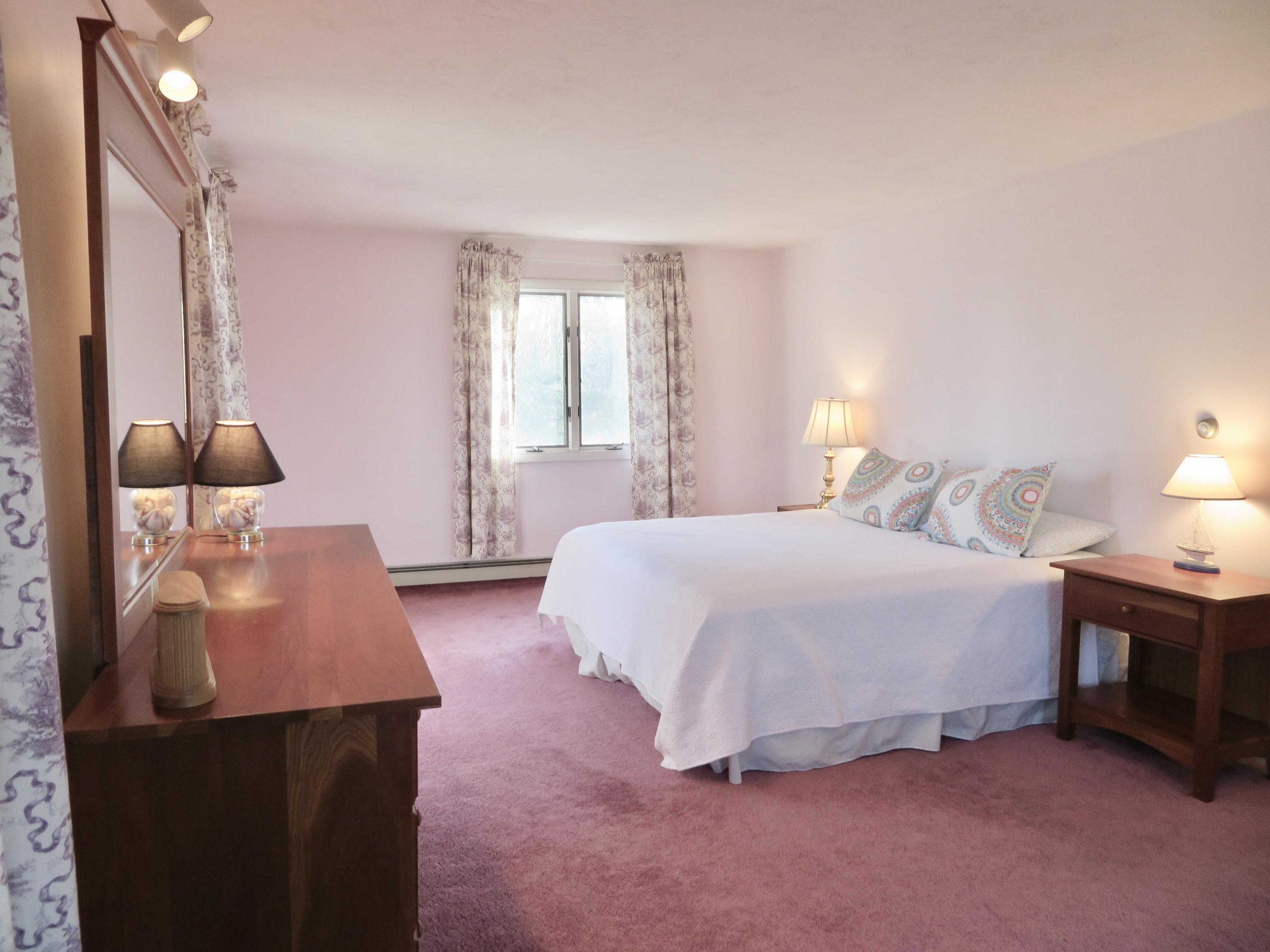 111 Elgin Road Pocasset, MA 02559 - Photo 23 of 34 a bedroom with bed and window