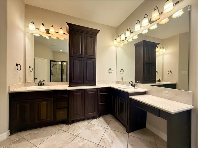 a bathroom with a tub and a shower