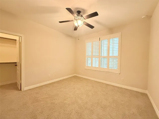 a view of a hallway with a couch