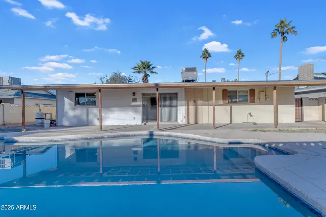a view of a house with entertaining space