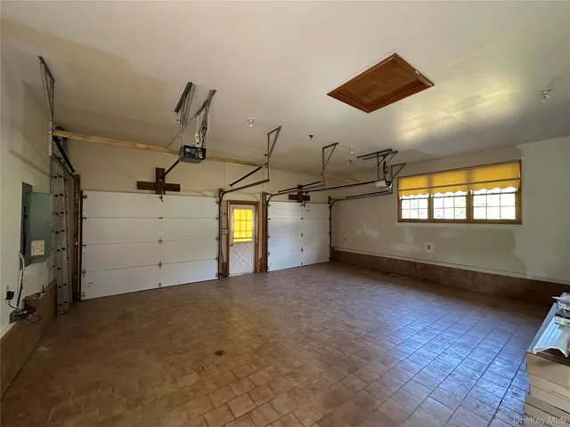 a view of an empty room with stairs
