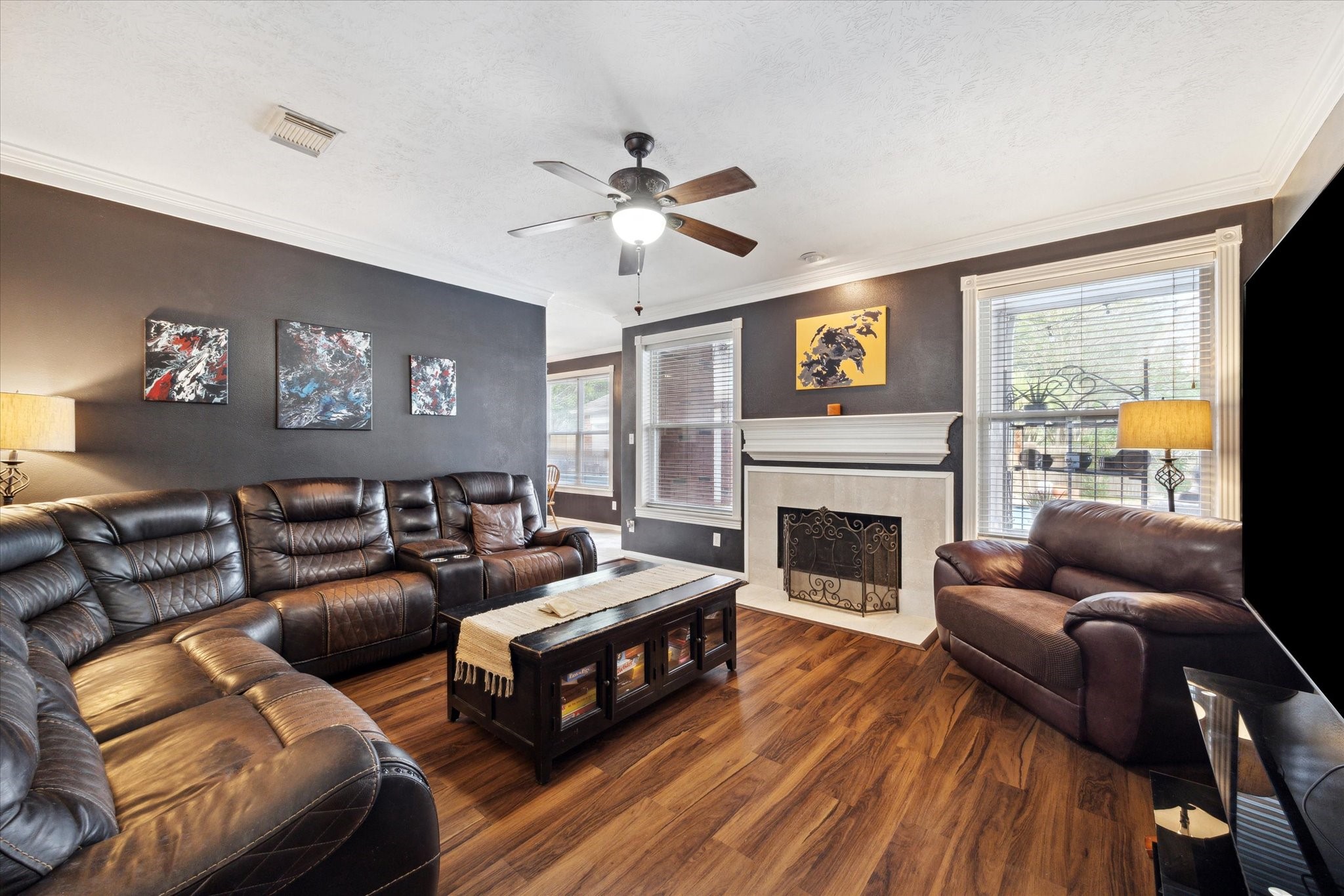 2326 Pin Hook Court Seabrook, TX 77586 - Photo 13 of 42 a living room with furniture a fireplace and a large window