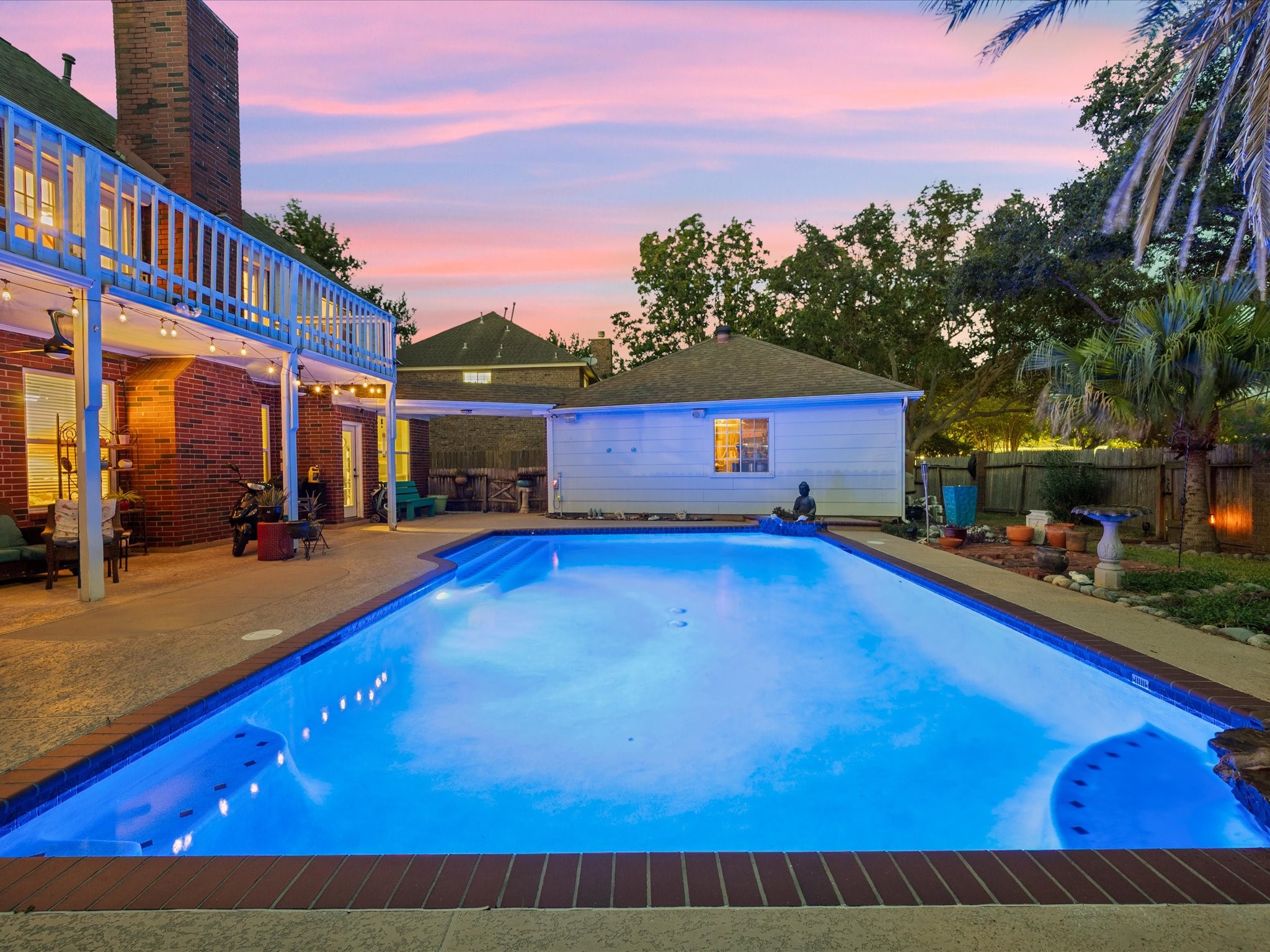 2326 Pin Hook Court Seabrook, TX 77586 - Photo 2 of 42 a view of swimming pool with outdoor seating