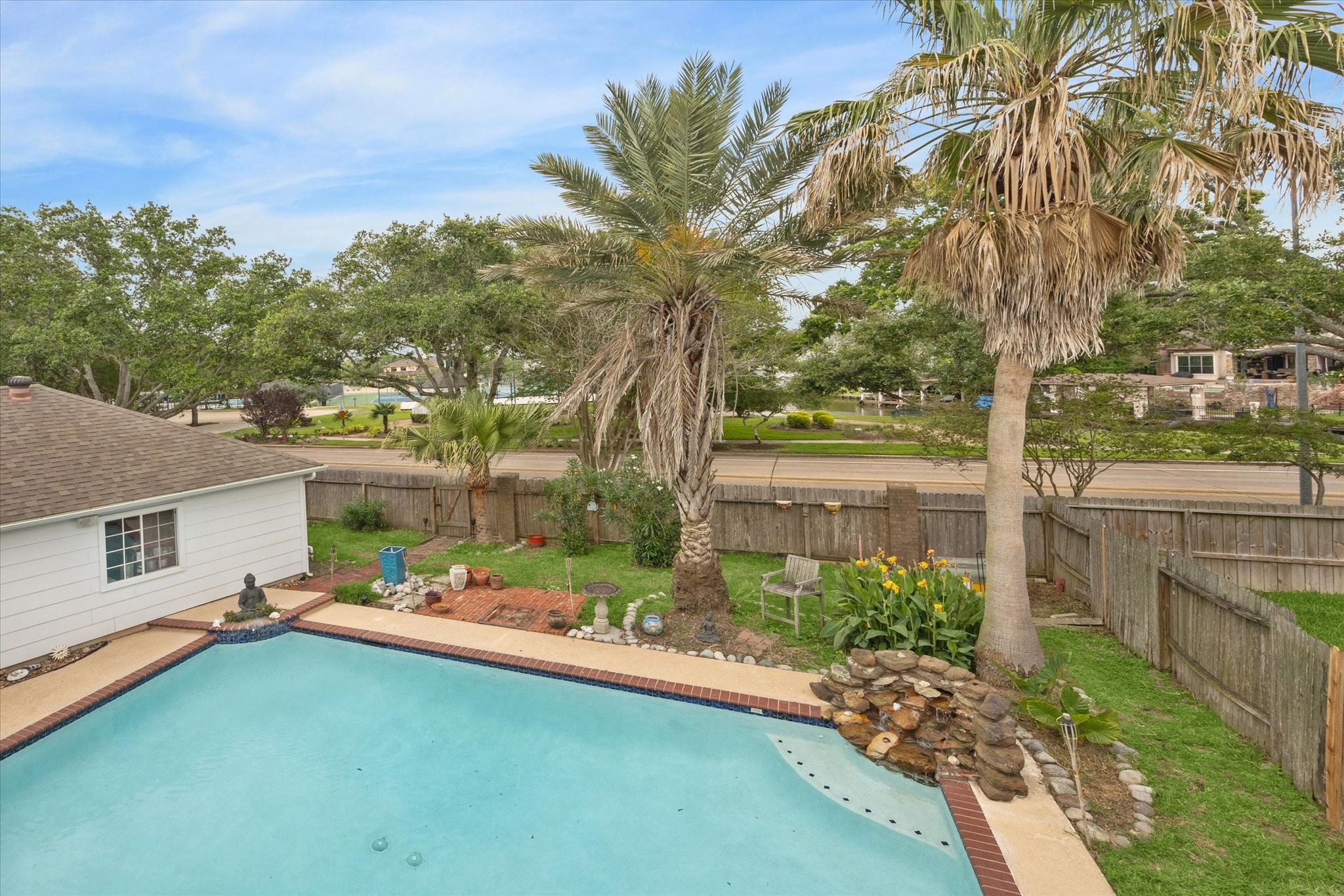 2326 Pin Hook Court Seabrook, TX 77586 - Photo 21 of 42 a front view of house with yard and trees around