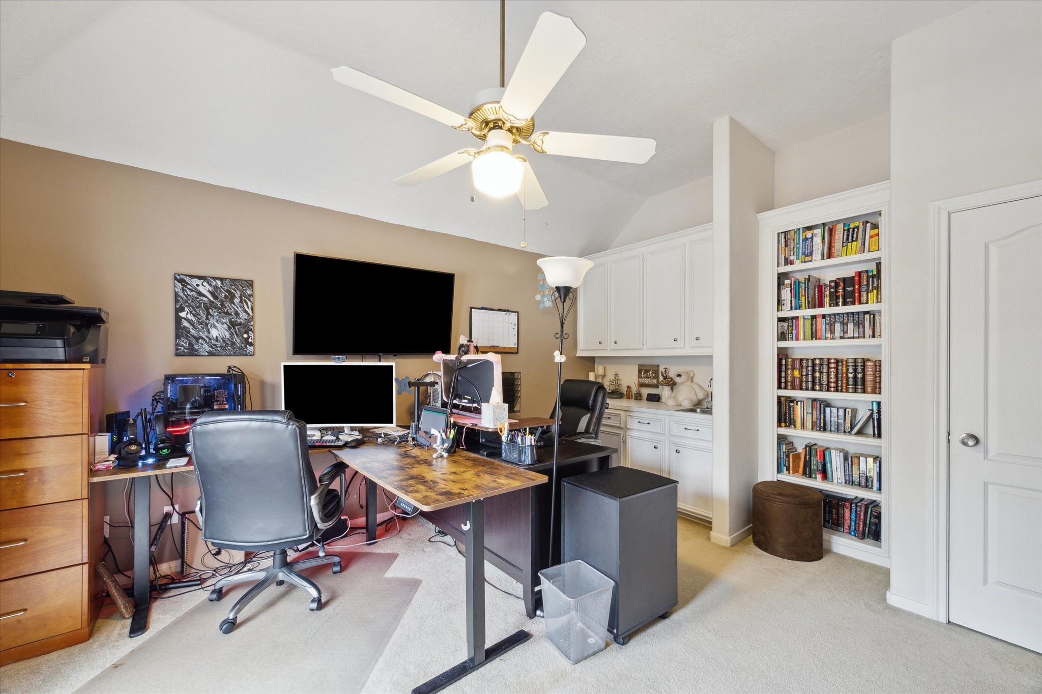 2326 Pin Hook Court Seabrook, TX 77586 - Photo 24 of 42 a view of a workspace with a window and a ceiling fan