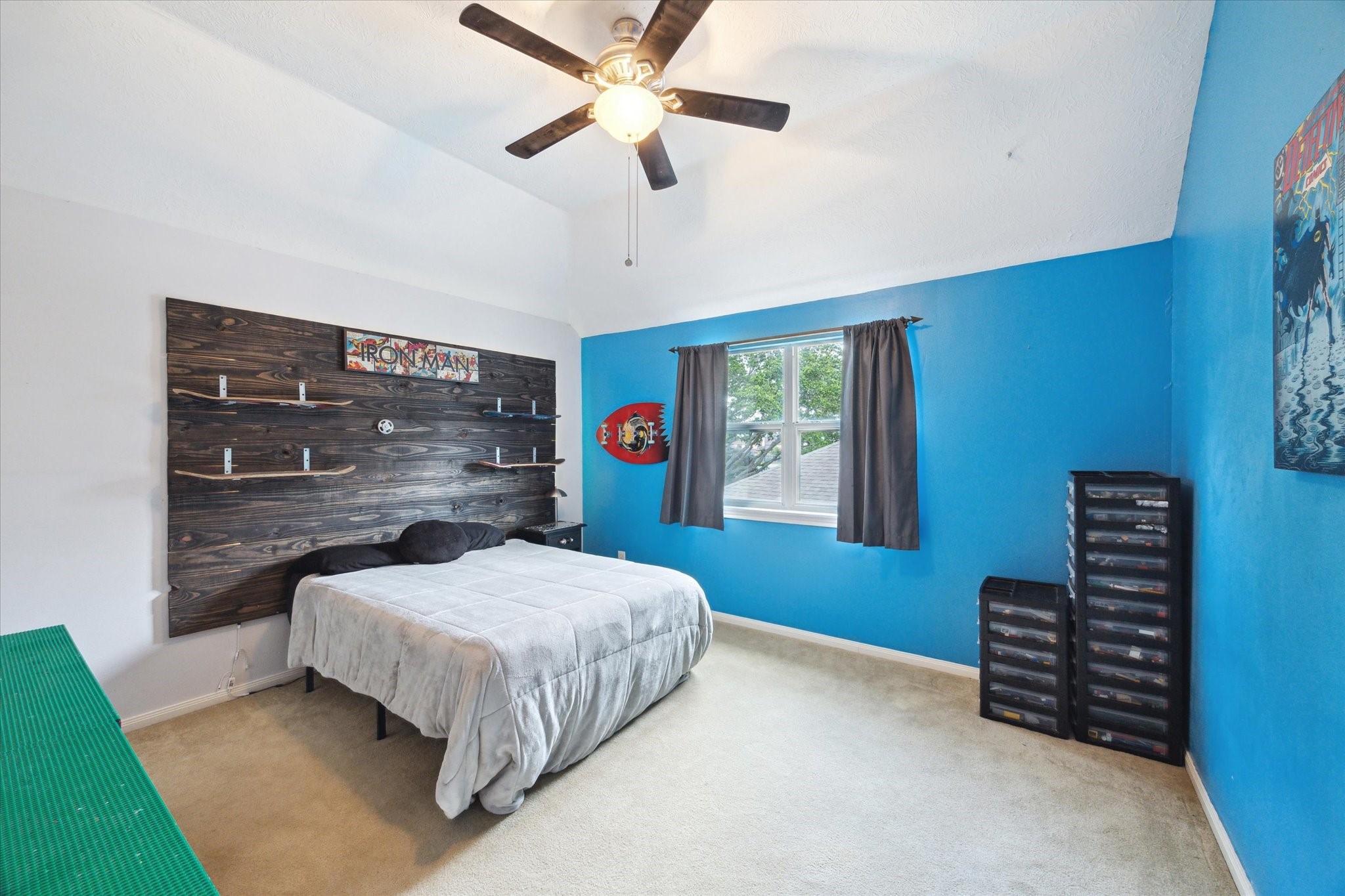 2326 Pin Hook Court Seabrook, TX 77586 - Photo 25 of 42 a bedroom with a bed and a chandelier