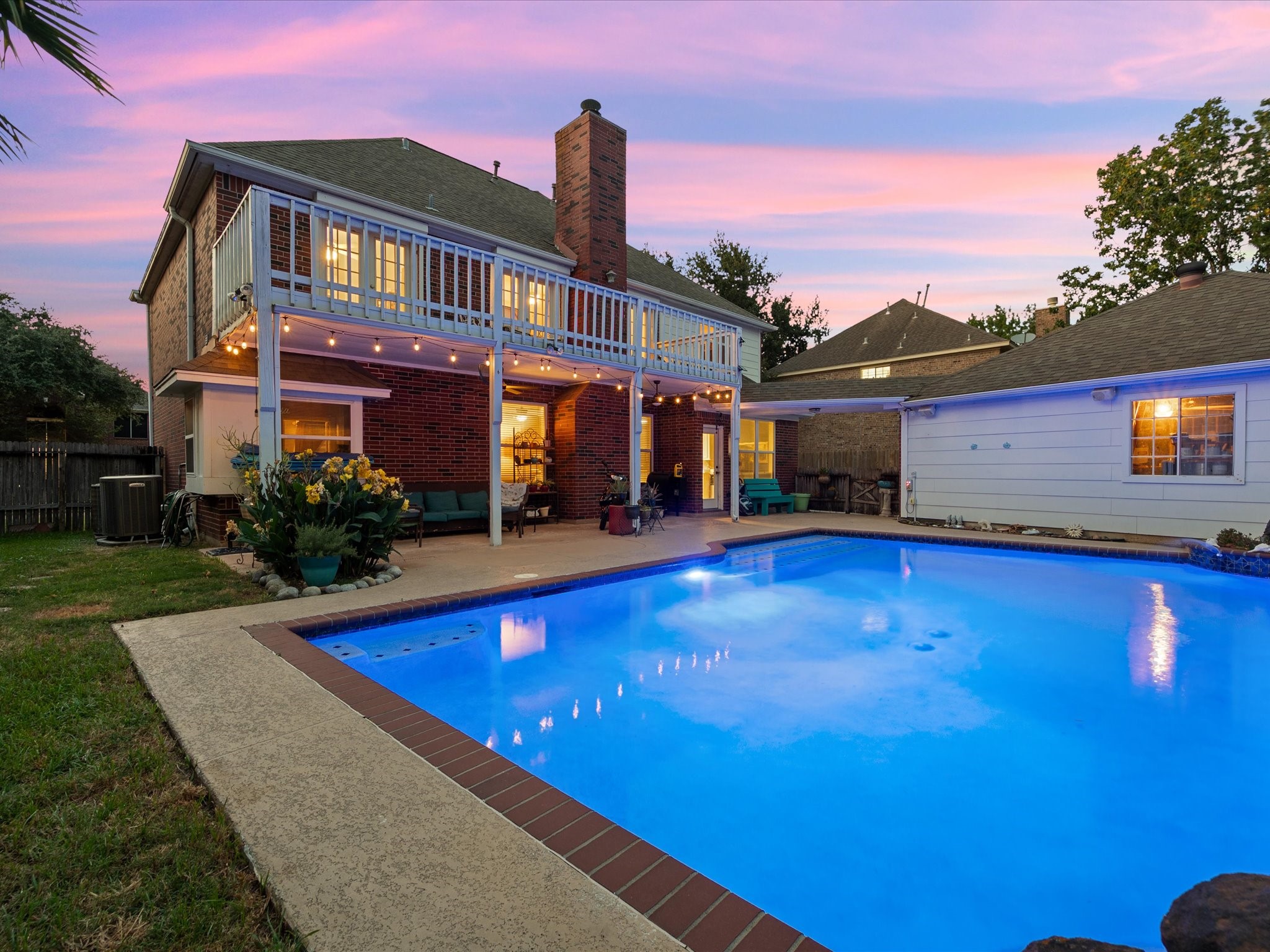 2326 Pin Hook Court Seabrook, TX 77586 - Photo 32 of 42 a front view of house with yard and outdoor seating