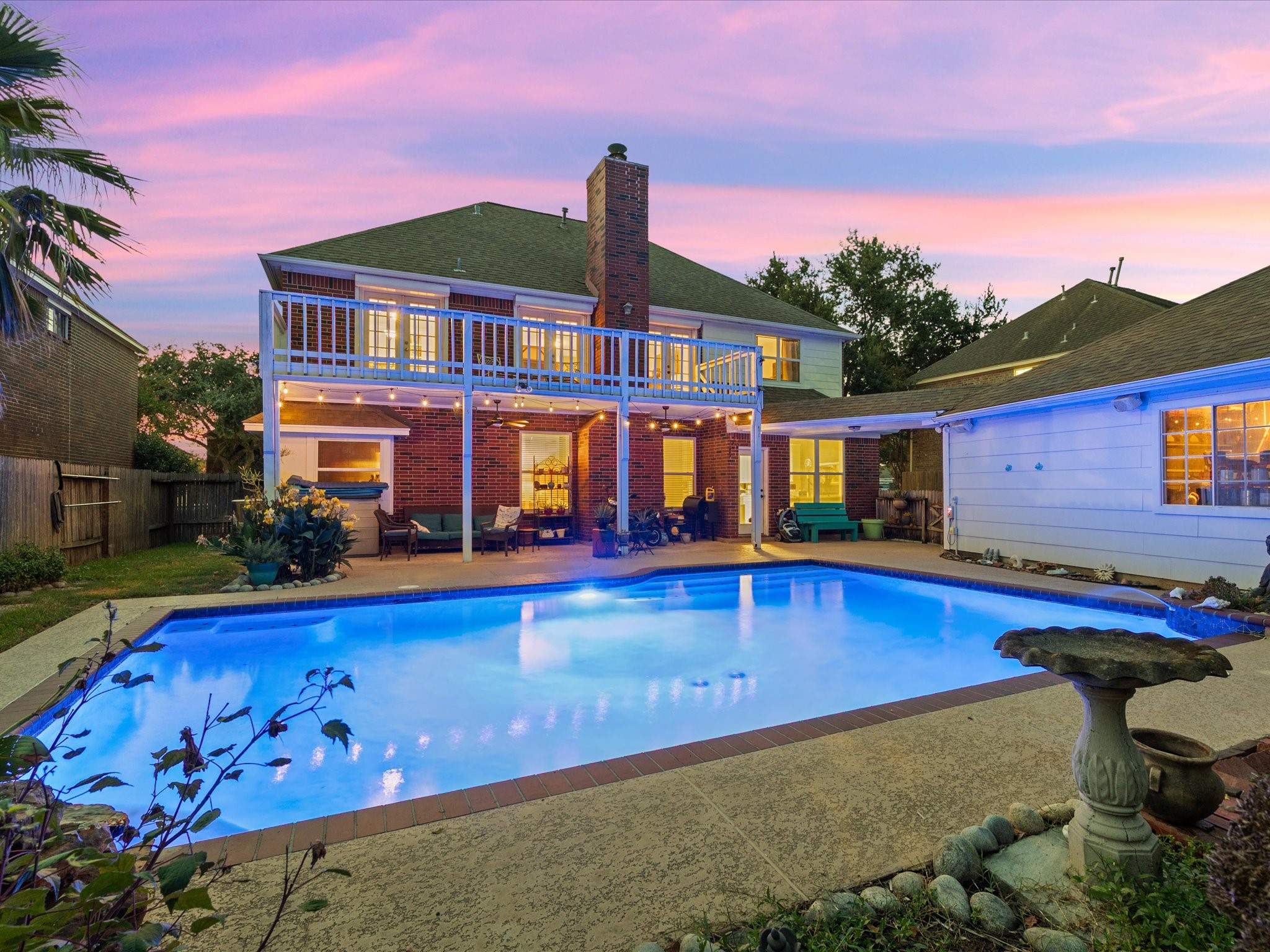 2326 Pin Hook Court Seabrook, TX 77586 - Photo 33 of 42 a view of swimming pool with a yard and plants