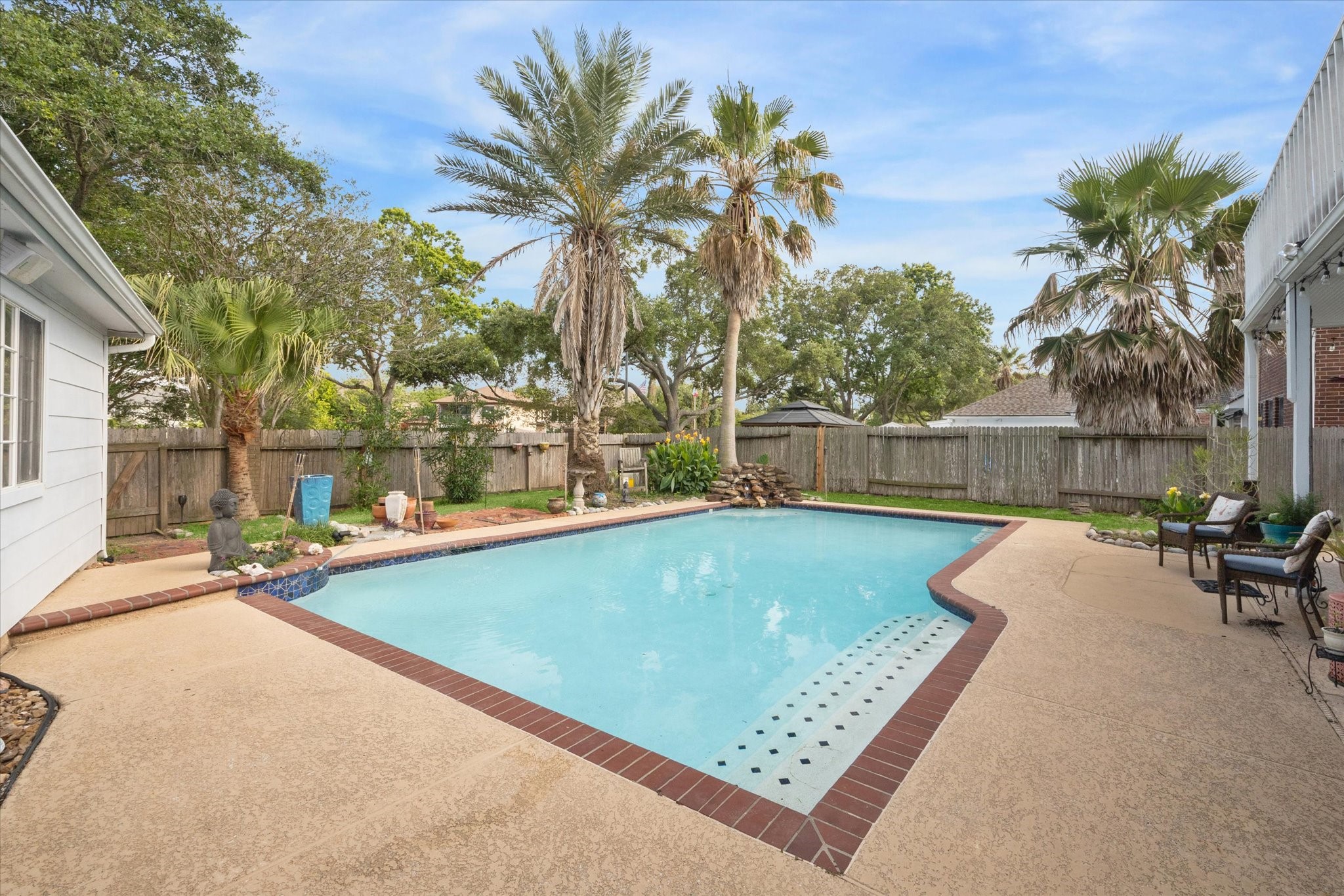 2326 Pin Hook Court Seabrook, TX 77586 - Photo 35 of 42 a view of a swimming pool with a lounge chairs