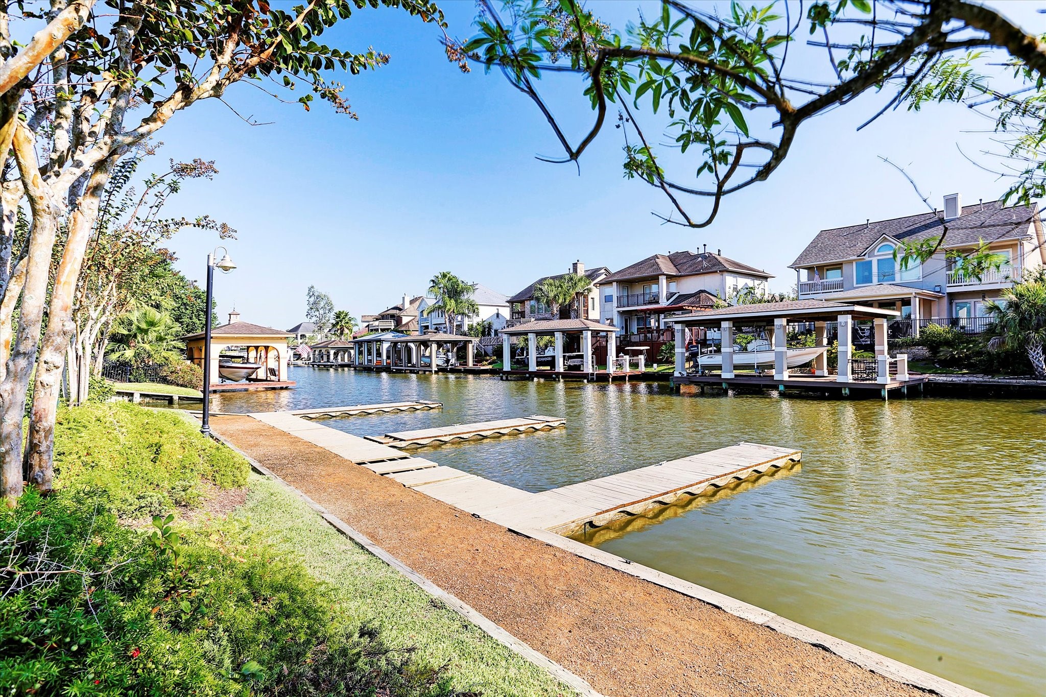 2326 Pin Hook Court Seabrook, TX 77586 - Photo 39 of 42 a view of a lake with houses