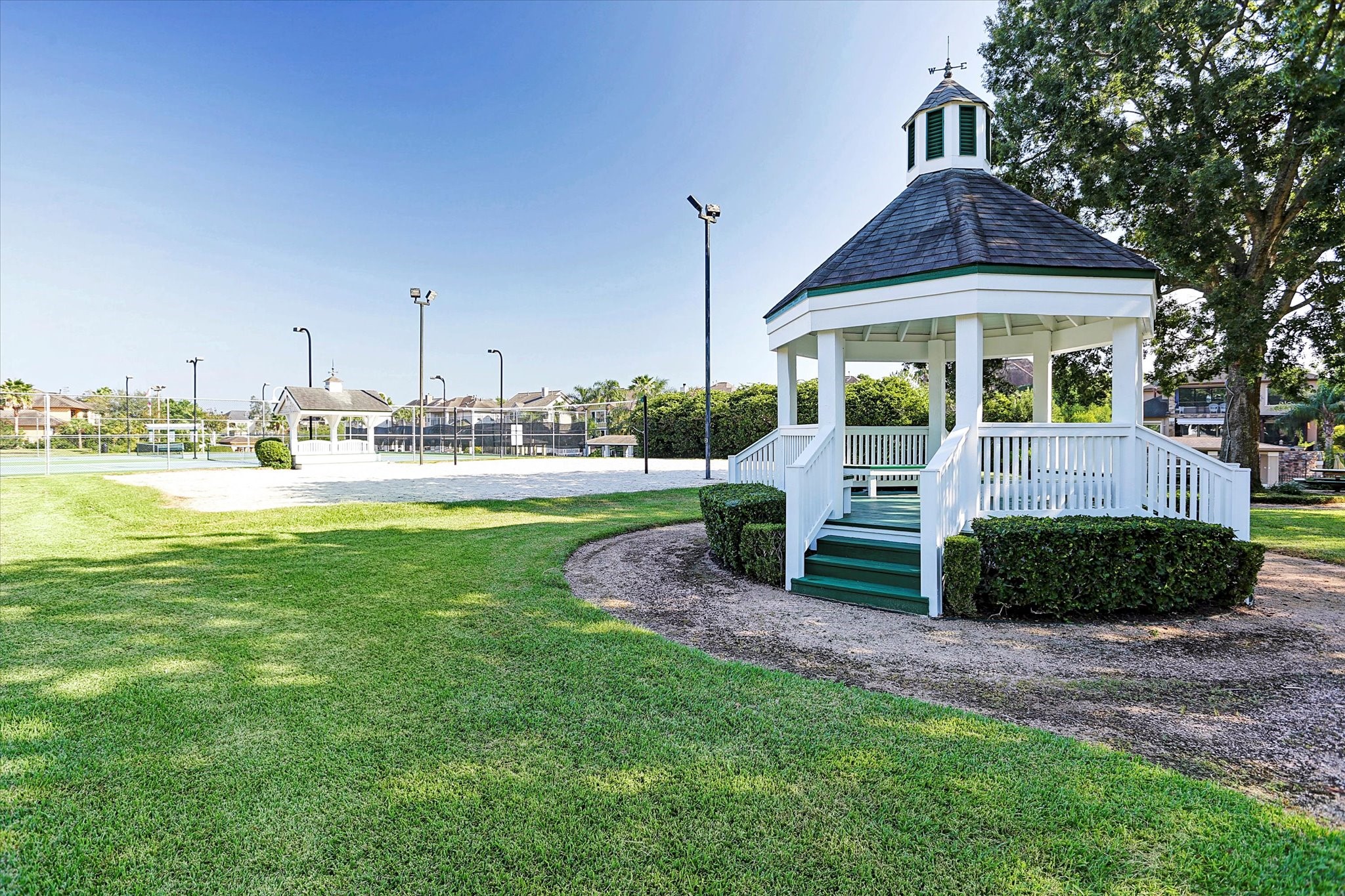2326 Pin Hook Court Seabrook, TX 77586 - Photo 41 of 42 a front view of a house with garden and trees