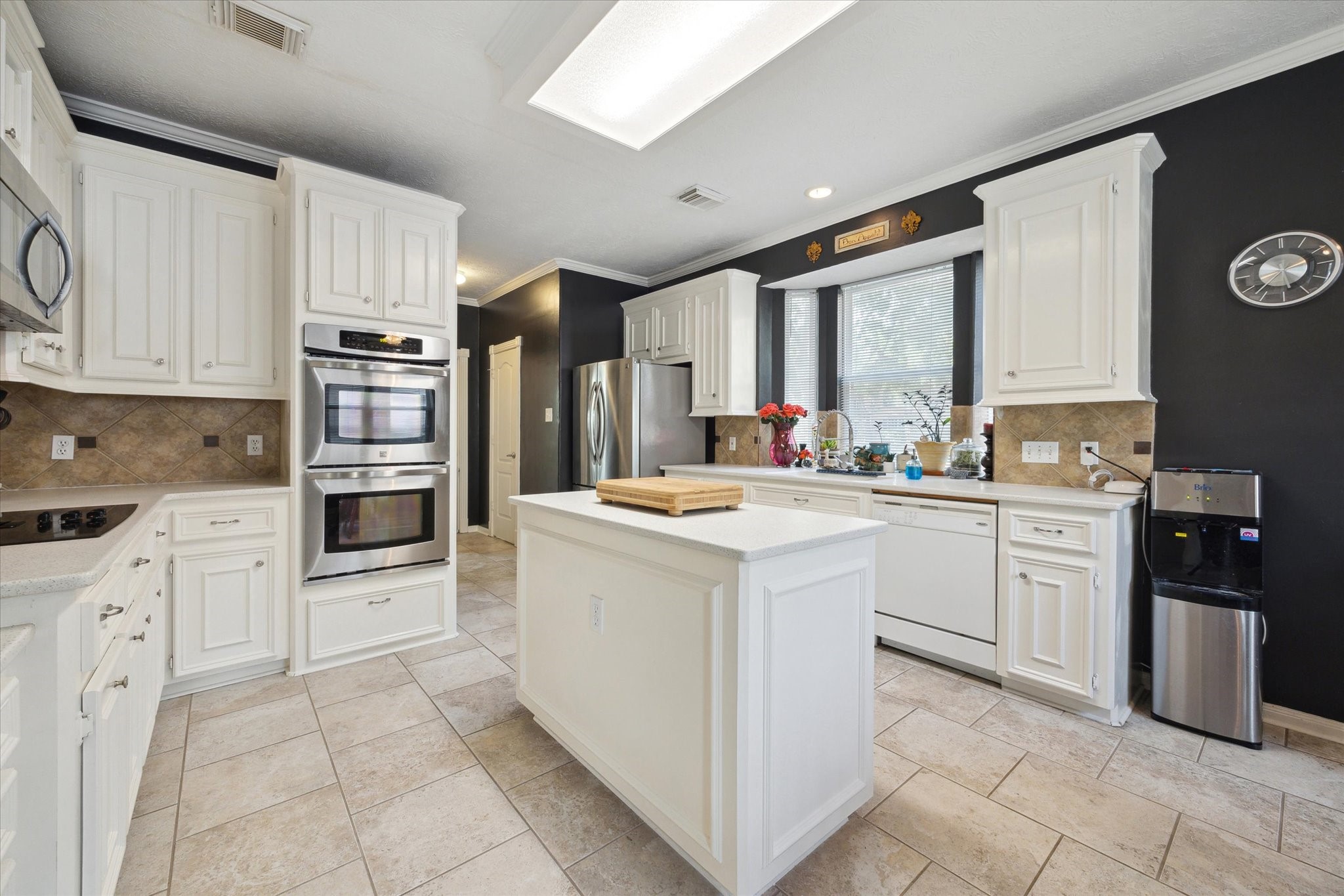 2326 Pin Hook Court Seabrook, TX 77586 - Photo 8 of 42 a kitchen with kitchen island granite countertop cabinets and steel stainless steel appliances