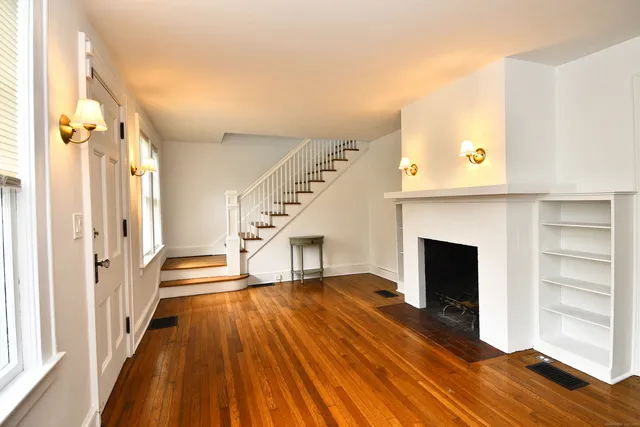 a view of entryway with wooden floor
