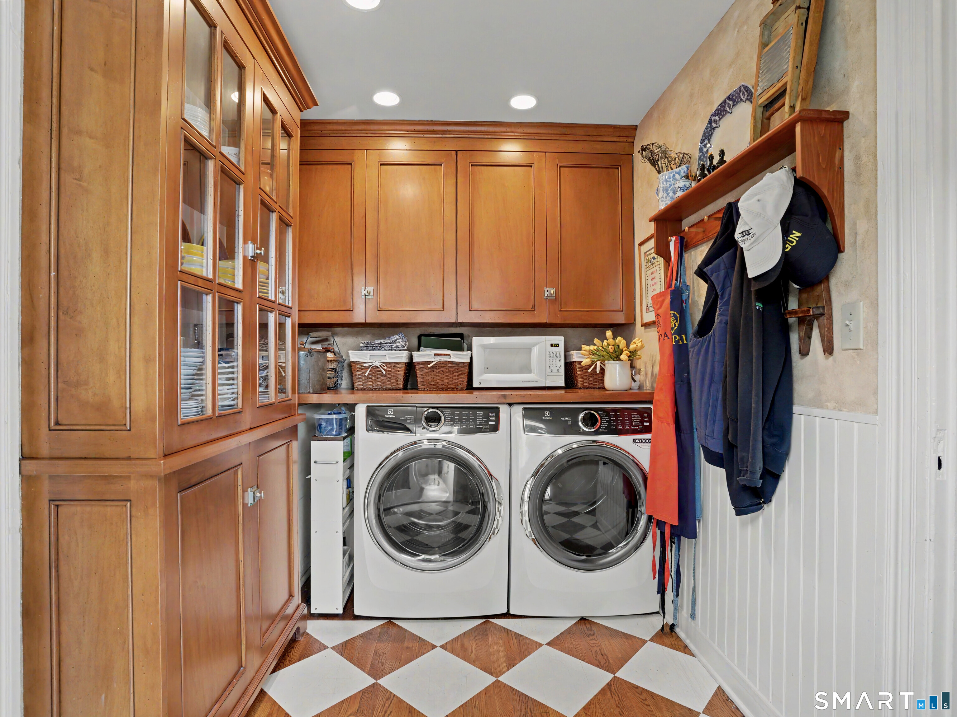 2477 Bronson Road Fairfield, CT 06824 - Photo 16 of 39 a utility room with dryer and washer