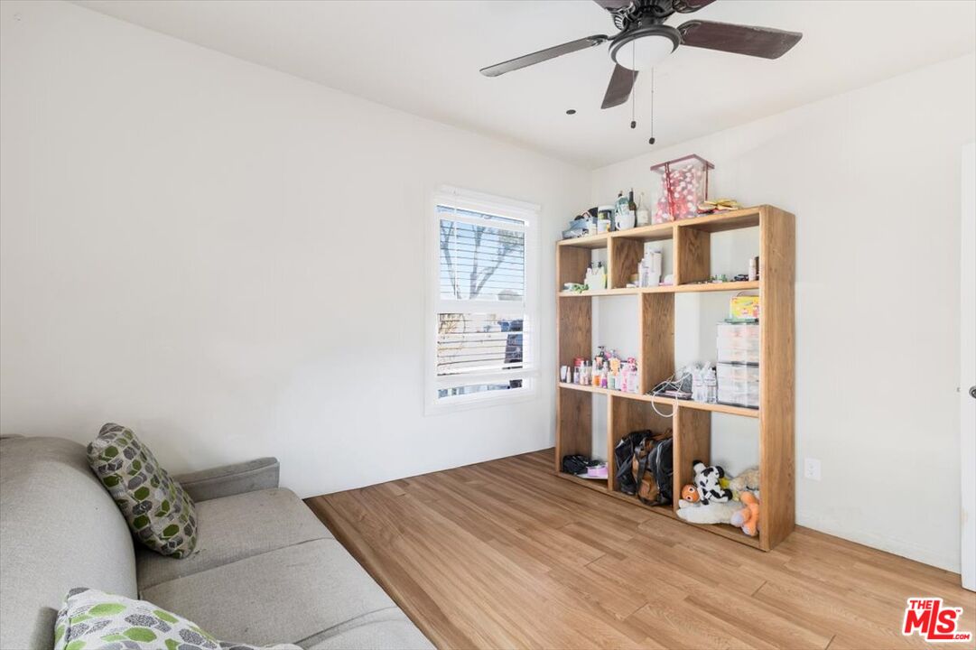 1206 West Magnolia Street Compton, CA 90220 - Photo 20 of 40 a very nice looking room with a big bed