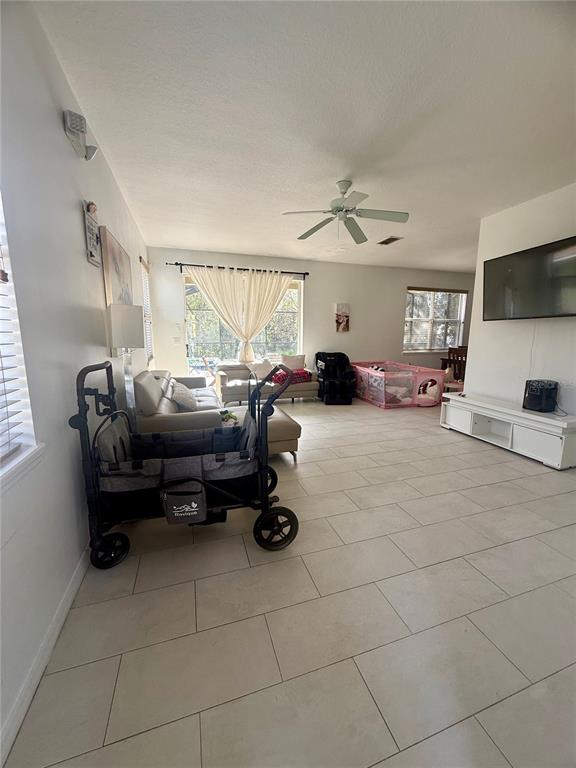 1008 Royal Ridge Drive Davenport, FL 33896 - Photo 4 of 19 a bedroom with furniture
