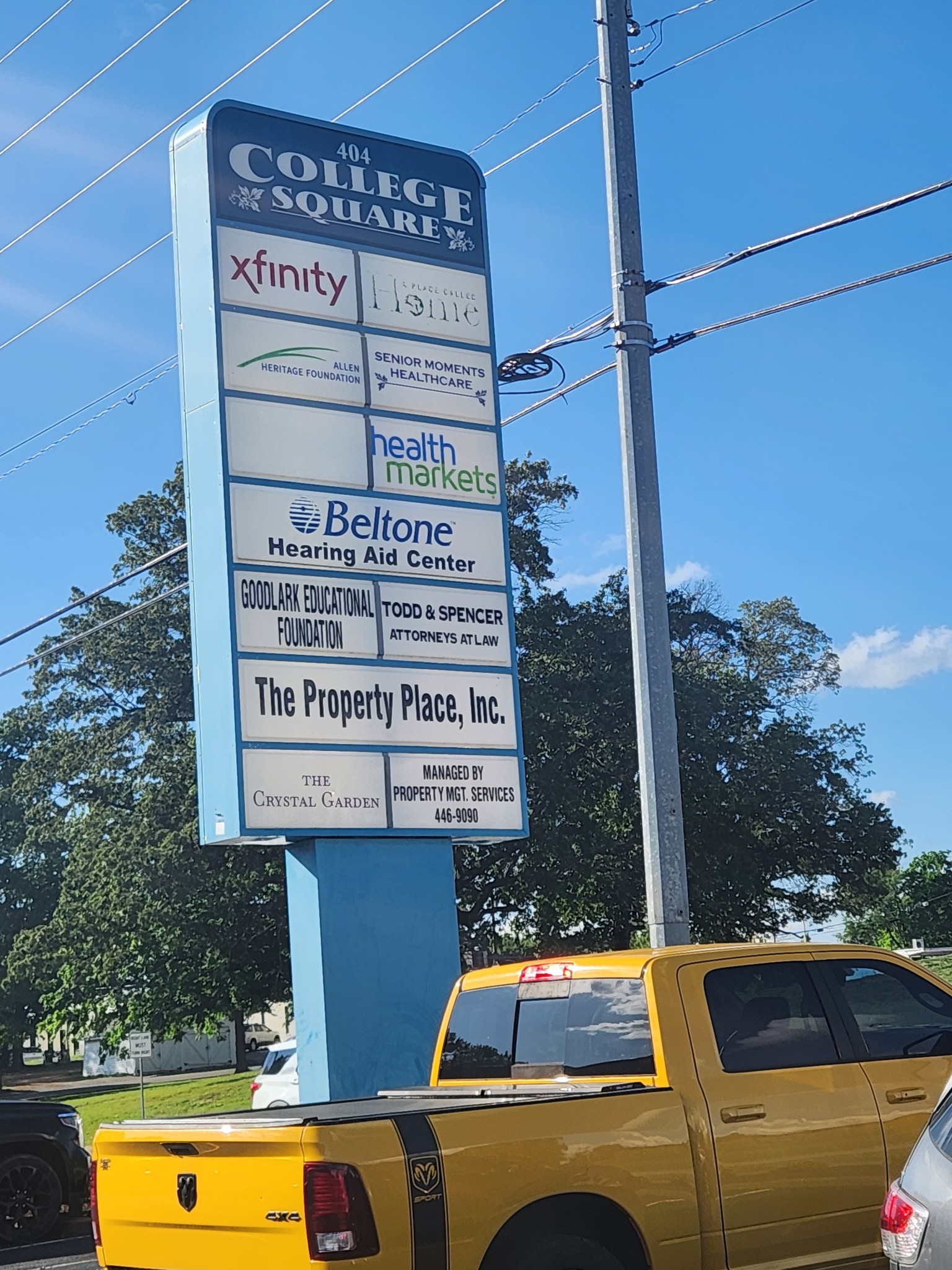 404 East College Street Dickson, TN 37055 - Photo 2 of 8 a view of a street sign on a city street