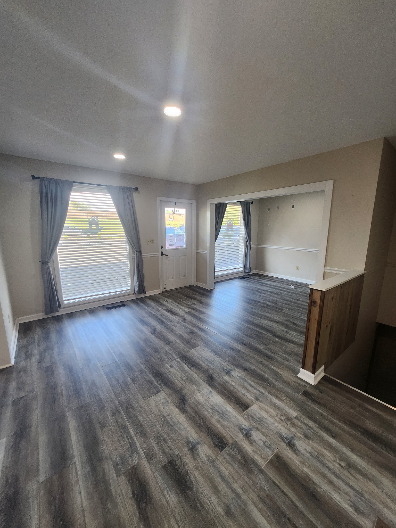404 East College Street Dickson, TN 37055 - Photo 5 of 8 an empty room with wooden floor and window