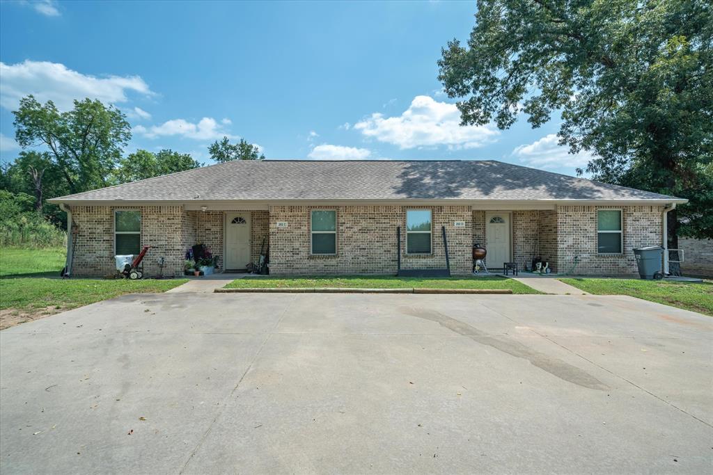 202 Chestnut Drive Van, TX 75790 - Photo 2 of 12 Single story home featuring a front yard, brick siding, and roof with shingles