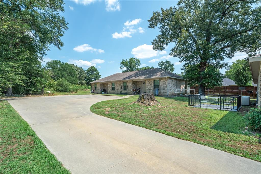 202 Chestnut Drive Van, TX 75790 - Photo 10 of 12 Ranch-style house with concrete driveway