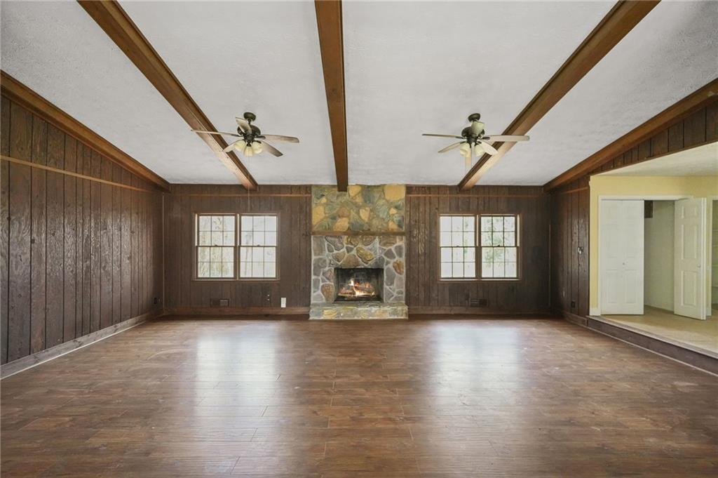 665 Arnold Road Lawrenceville, GA 30044 - Photo 15 of 38 a view of an empty room with a window and fireplace