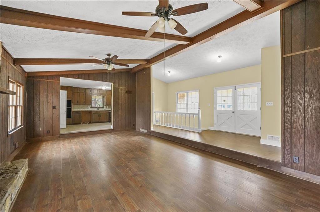 665 Arnold Road Lawrenceville, GA 30044 - Photo 16 of 38 an empty room with wooden floor and windows