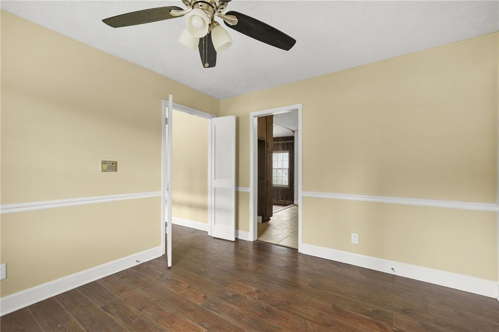665 Arnold Road Lawrenceville, GA 30044 - Photo 18 of 38 a view of an empty room with a window