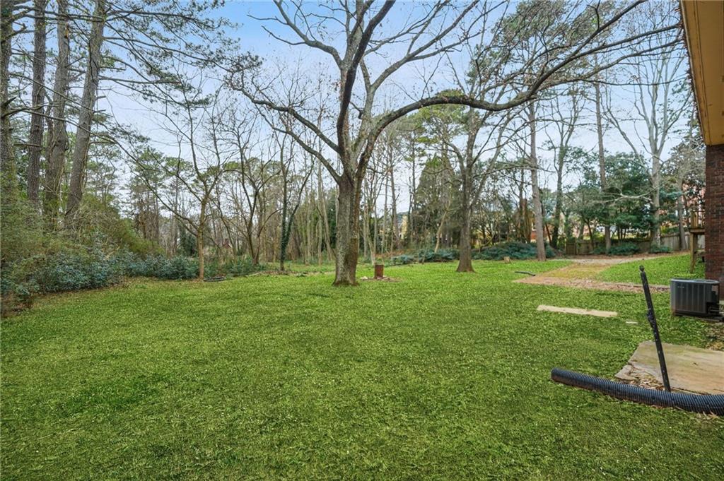 665 Arnold Road Lawrenceville, GA 30044 - Photo 23 of 38 a view of a park with large trees