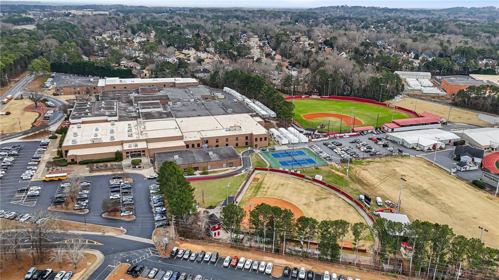 665 Arnold Road Lawrenceville, GA 30044 - Photo 37 of 38 an aerial view of a house with a swimming pool