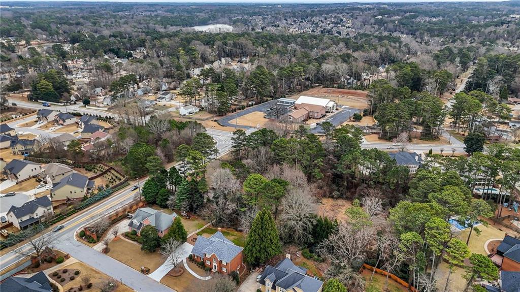 665 Arnold Road Lawrenceville, GA 30044 - Photo 6 of 38 an aerial view of a house with a yard