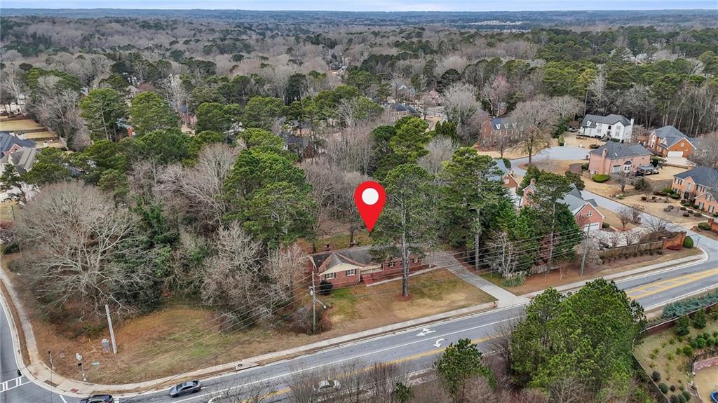 665 Arnold Road Lawrenceville, GA 30044 - Photo 9 of 38 an aerial view of a residential houses