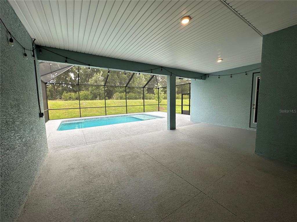 7526 Southwest 65th Place Road Ocala, FL 34474 - Photo 26 of 28 a view of an empty room with a window