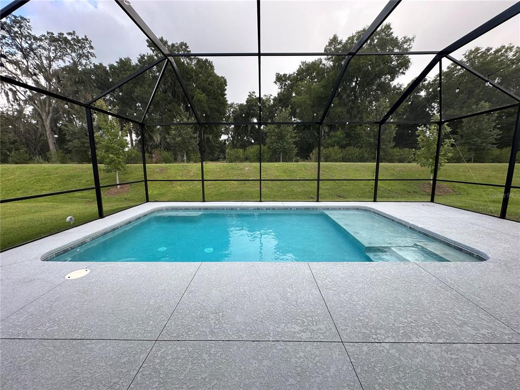 7526 Southwest 65th Place Road Ocala, FL 34474 - Photo 3 of 28 a view of a tennis court