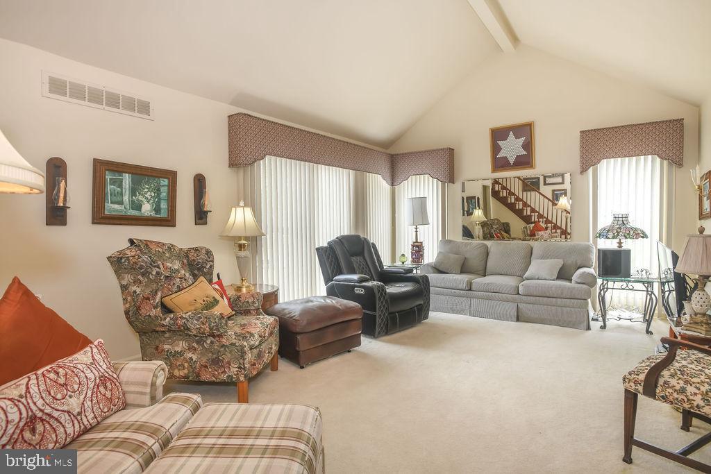 2 Battle Drive Newark, DE 19702 - Photo 15 of 35 a living room with furniture or couch and a large window