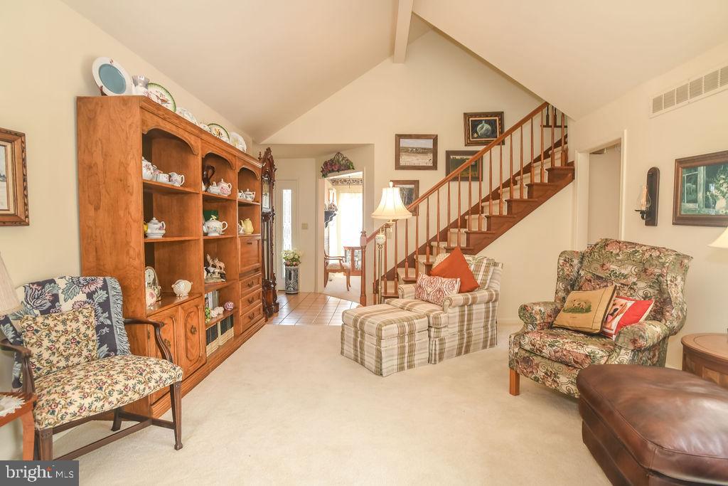 2 Battle Drive Newark, DE 19702 - Photo 16 of 35 a living room with furniture and stairs