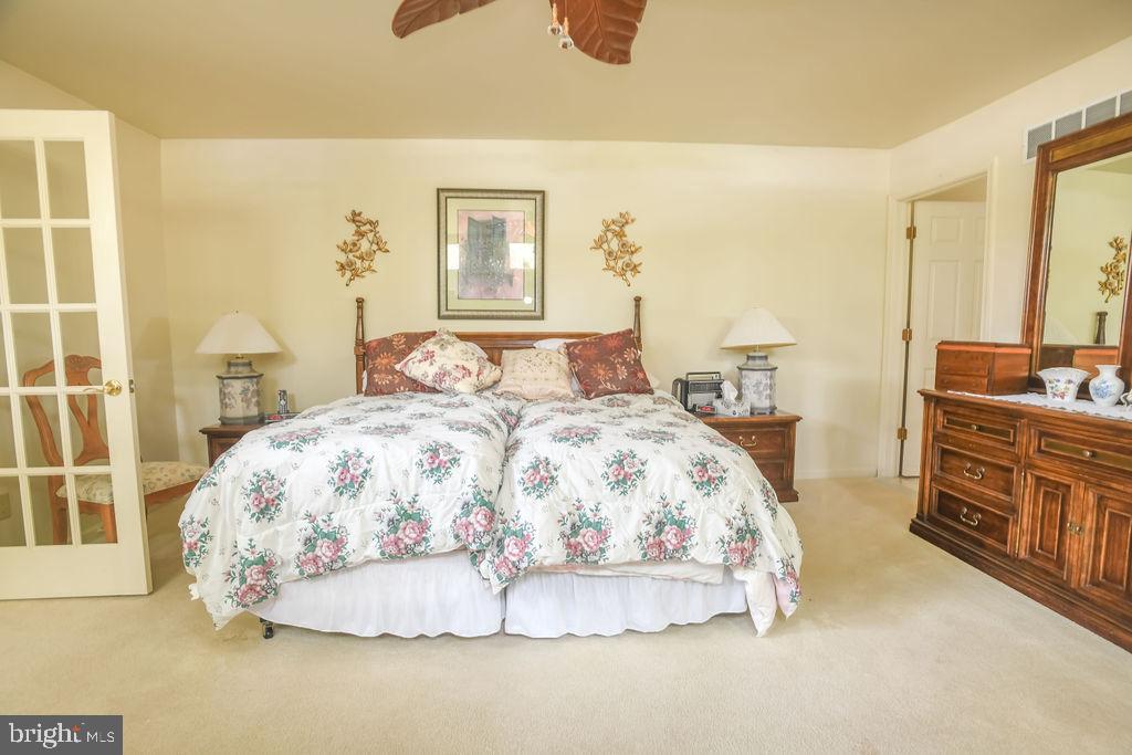 2 Battle Drive Newark, DE 19702 - Photo 23 of 35 a bedroom with a bed and a dresser