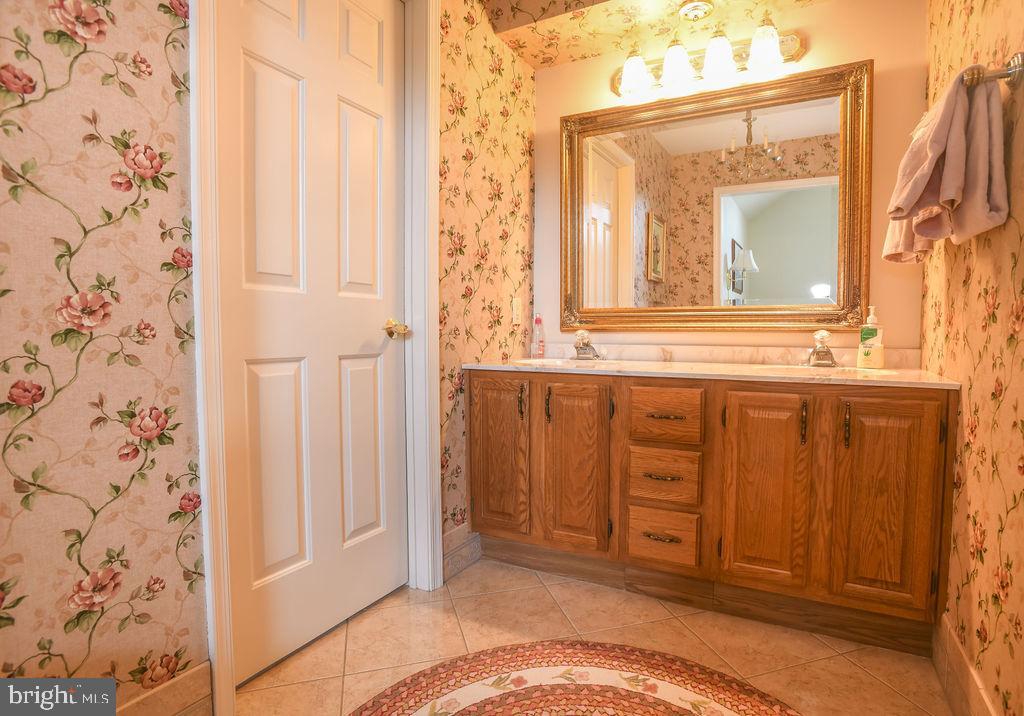 2 Battle Drive Newark, DE 19702 - Photo 27 of 35 a view of a bathroom with a sink and a window