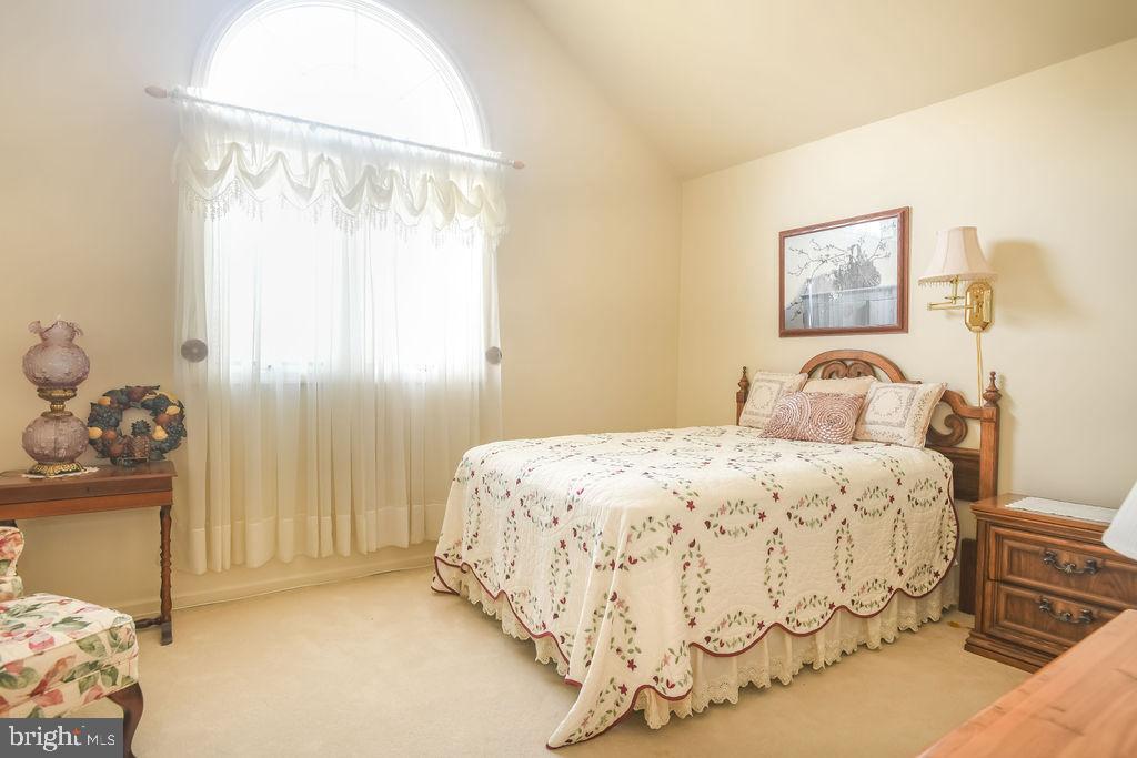 2 Battle Drive Newark, DE 19702 - Photo 29 of 35 a bedroom with a bed and a window