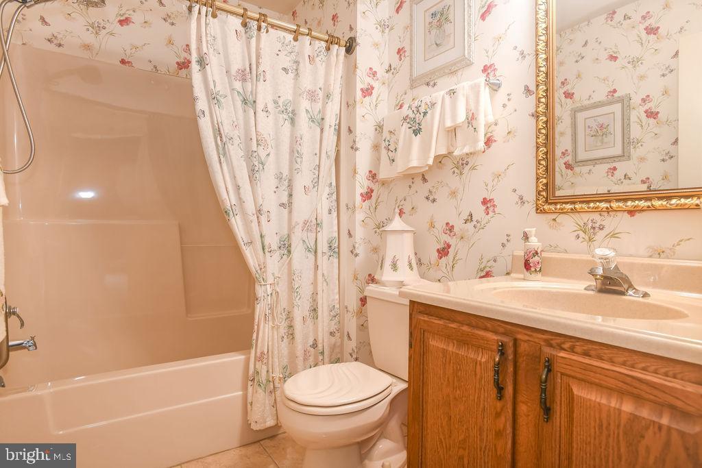 2 Battle Drive Newark, DE 19702 - Photo 32 of 35 a bathroom with a sink toilet and shower