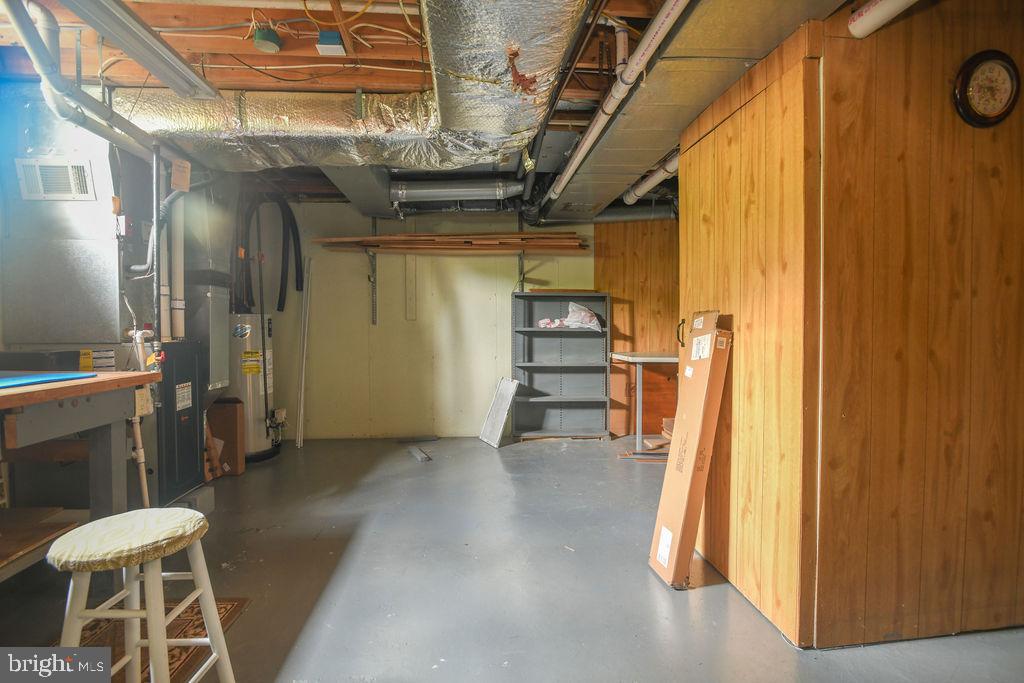 2 Battle Drive Newark, DE 19702 - Photo 34 of 35 a view of a hallway with wooden shelves