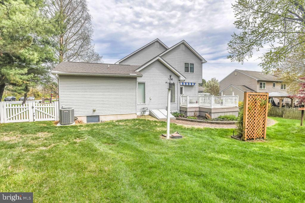 2 Battle Drive Newark, DE 19702 - Photo 7 of 35 a house that is sitting in the grass