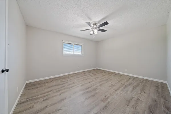 a bathroom with a double vanity sink mirror and toilet