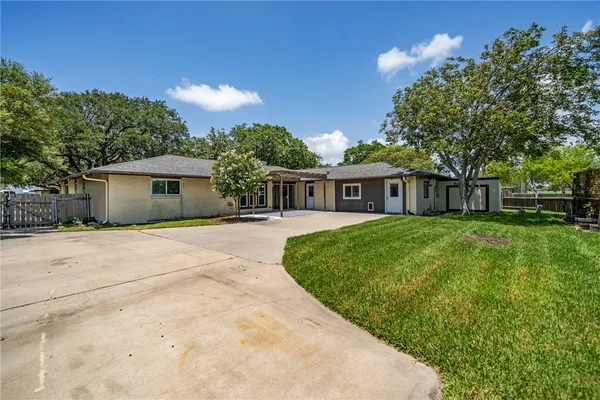 a view of outdoor space yard and front view of a house