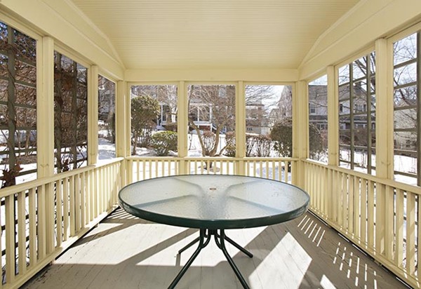42 Lovell Road Watertown, MA 02472 - Photo 6 of 6 a bath room with a table and chairs