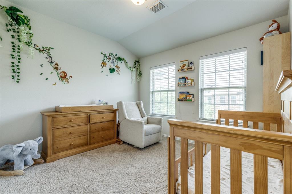 3932 Asbury Lane Addison, TX 75001 - Photo 17 of 18 a bedroom with furniture and a window