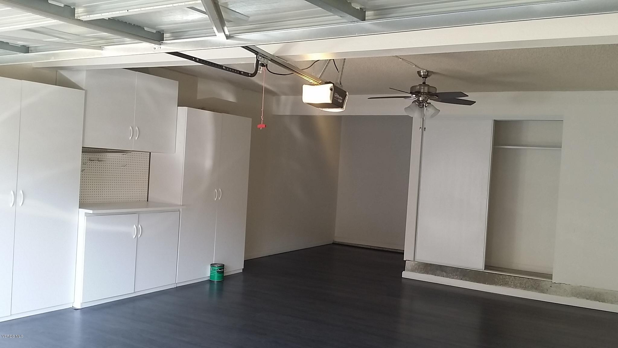 15076 Varsity Street, Unit C Moorpark, CA 93021 - Photo 14 of 18 a view of a room with wooden floor