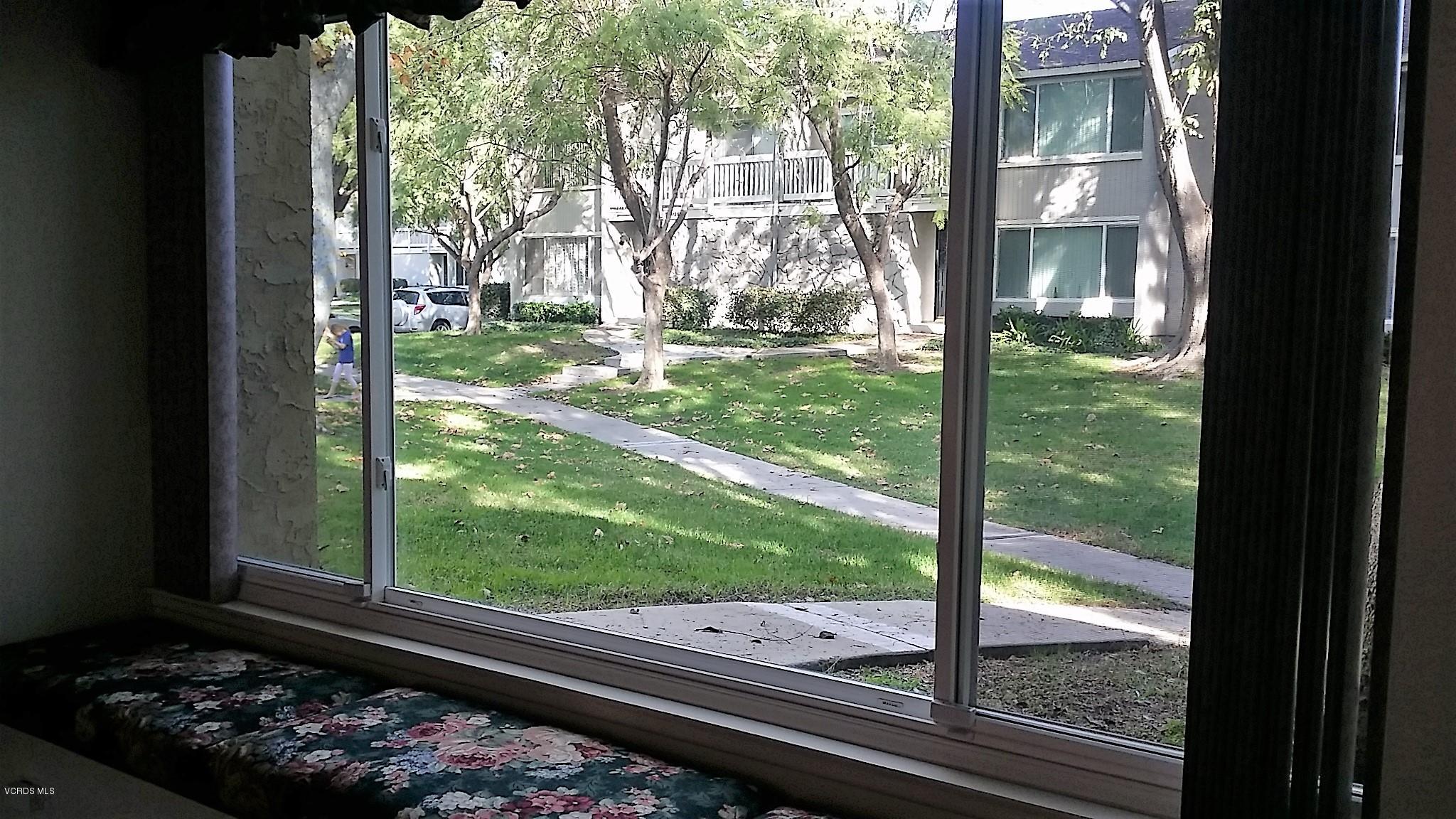 15076 Varsity Street, Unit C Moorpark, CA 93021 - Photo 7 of 18 a view of backyard from a window