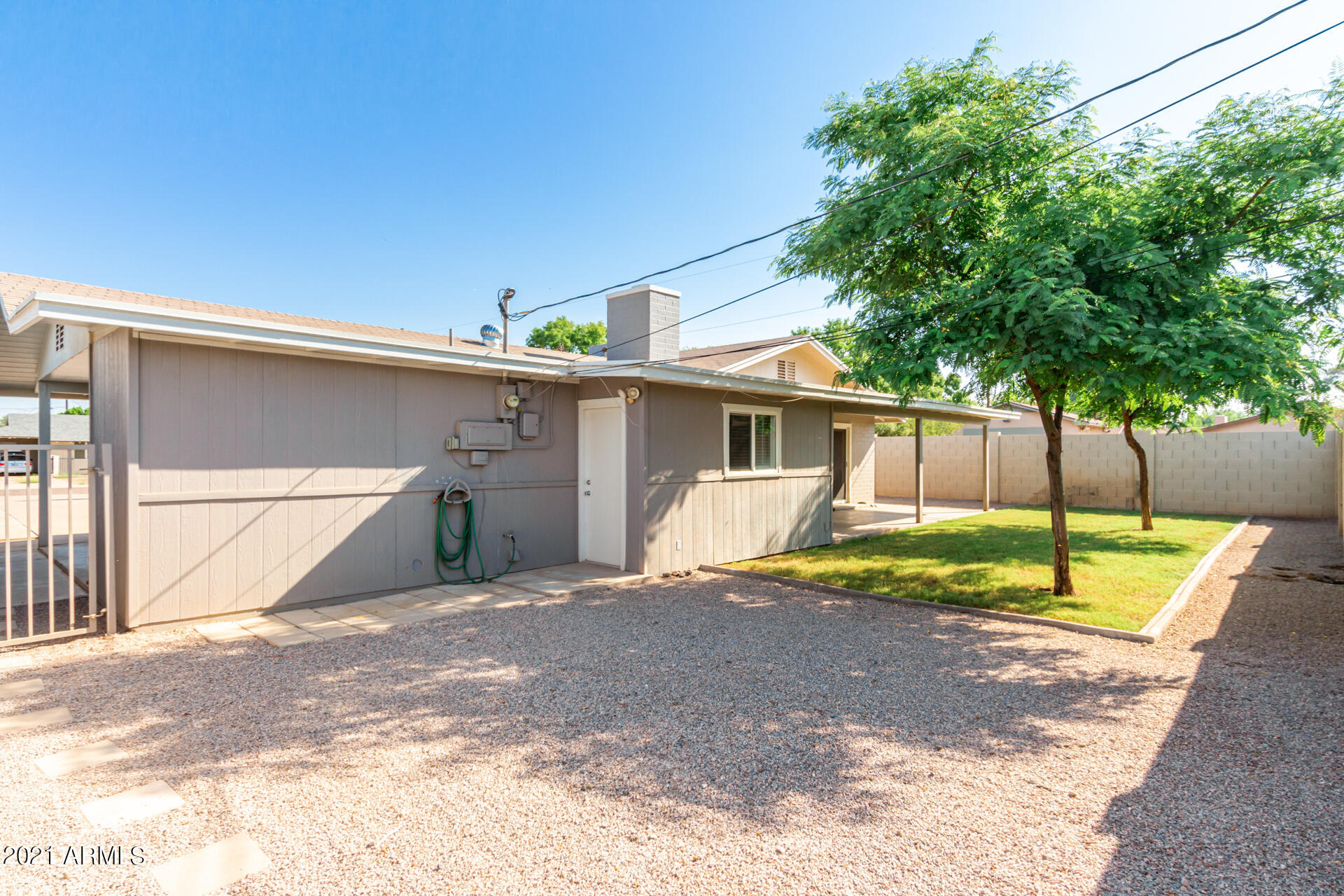 803 West Elna Rae Street Tempe, AZ 85281 - Photo 26 of 28 a view of a house with backyard and a tree